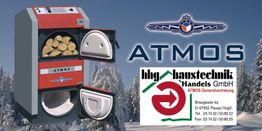 Brennwertkessel mit Holzscheiten, atmós-Logo und Kontaktdaten der ibg haustechnik Handels GmbH.