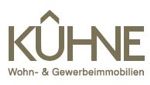 Logo von Kühne Wohn- & Gewerbeimmobilien in brauner Schrift mit Dachsymbol über dem Ü.