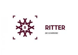 Logo mit stilisiertem Schneeflocken-Muster, einem "R" in der Mitte und dem Text "RITTER, DIE SCHÄRFEREI".
