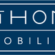 Logo "MiHOMi Immobiliare" su sfondo blu scuro con testo bianco e grafica moderna.
