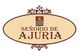 Emblema ovalado con la inscripción: "SEÑORÍO DE AJURIA" y un escudo en la parte superior.
