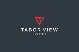 Red logo and text "Tabor View Lofts" on a dark background.