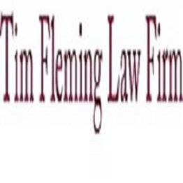 Text reading "Tim Fleming Law Firm" in maroon font on a white background.