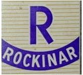 Letter "R" above the word "ROCKINAR" on a striped background.