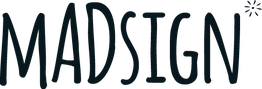 Teksten "MADSIGN" i mørk skrift med en lille stjerne i øverste højre hjørne.