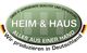 Grünes Logo von HEIM & HAUS, Text: "Alles aus einer Hand, Wir produzieren in Deutschland".