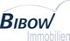 Logo von Bibow Immobilien mit Schriftzug und stilisiertem Bogen.