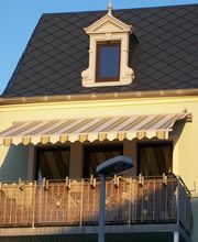 elektr. Gelenkarmmarkise mit Windwächter