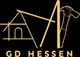 Logo von GD Hessen: Haus und Hammer in gelber Linie auf schwarzem Hintergrund.
