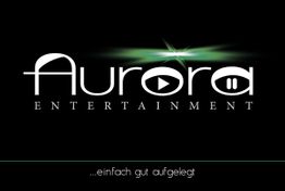 Logo von Aurora Entertainment mit grünem Licht und Text "einfach gut aufgelegt" auf schwarzem Hintergrund.