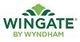 Logo of Wingate by Wyndham with green stylized design above the text.