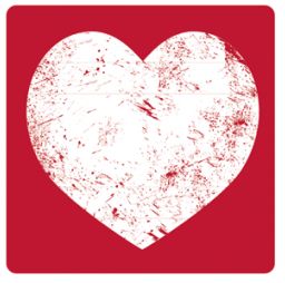Weißes Herz mit Kratzspuren auf rotem Hintergrund.