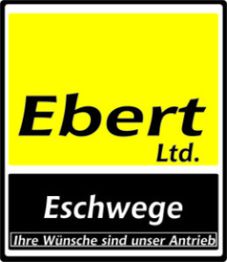 Logo von Ebert Ltd., Eschwege, mit Slogan "Ihre Wünsche sind unser Antrieb" auf gelbem Hintergrund.