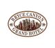 Logo of Bryce Canyon Grand Hotel with rock formations inside an oval border.
