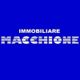 Logo su sfondo blu, testo bianco: "IMMOBILIARE MACCHIONE."
