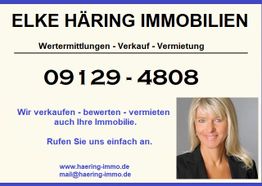Visitenkarte von Elke Häring Immobilien mit Kontaktdaten und Portraitbild einer Frau.