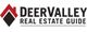 Logo of Deer Valley Real Estate Guide with a red and black house icon.