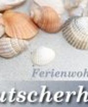 Ferienwohnung Kutscherhuus Logo