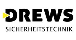 Logo von Drews Sicherheitstechnik mit gelbem Dreieck und schwarzem Schriftzug auf weißem Hintergrund.