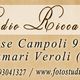 Foto Studio Riccardo, indirizzo e contatti, con obiettivo fotografico stilizzato a destra.