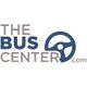 The Bus Center logo with a steering wheel design, featuring the text "THE BUS CENTER.com".