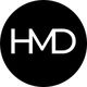 Black circle with white letters "HMD" in the center.