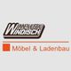 Logo mit Text: "Innenausbau Windisch" und "Möbel & Ladenbau" auf grauem Hintergrund.