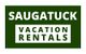 Green sign with white text: "Saugatuck Vacation Rentals."