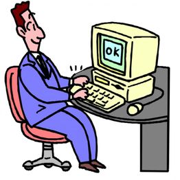 Ein Mann im Anzug sitzt am Schreibtisch und tippt auf einer Tastatur, der Monitor zeigt "OK".