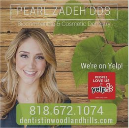 Smiling woman with text promoting biocompatible and cosmetic dentistry services, contact info below.