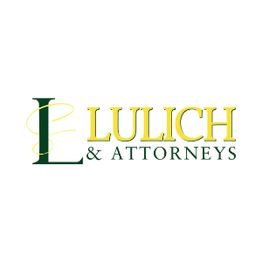 Logo reading "Lulich & Attorneys" with a decorative "L" in green and yellow letters.