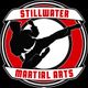 Silhouette of a kicking martial artist in a red and white badge reading "Stillwater Martial Arts."