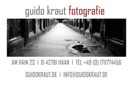 Eine Schwarzweiß-Fotografie eines langen Gangs mit der Aufschrift "guido kraut fotografie".