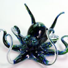 Colorful glass octopus sculpture with detailed swirling tentacles.