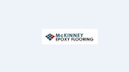 Logo of McKinney Epoxy Flooring with diamond pattern and blue and red tiles.