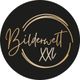 Schwarzes Logo mit goldener Schrift "Bilderwelt XXL" in einem Kreis.