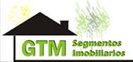 Logo de GTM Segmentos Imobiliários com casa e árvores em fundo branco.