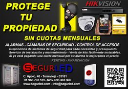 Anuncio de seguridad: "Protege tu propiedad sin cuotas". Información de contacto y productos.