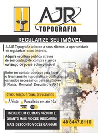 Panfleto da AJR Topografia sobre regularização de imóveis, destacando preços e contato 48 8447.8116.