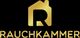 Logo: Goldene Silhouette eines Hauses mit Buchstaben "R" darin. Darunter steht "RAUCHKAMMER".