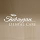 Logo of "Sheboygan Dental Care" on a brown background.