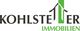 Logo von Kohlstetter Immobilien mit stilisiertem grünen Hausdach zwischen Firmenname.