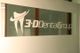 3-D Dental Group logo on frosted glass with a tooth illustration.