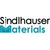 Logo mit Text "Sindlhauser Materials" in Schwarz und Blau.