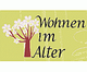 Grafik: Blühender Baum und Text "Wohnen im Alter" auf grünem Hintergrund.