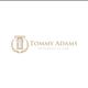 Gavel emblem with text: Tommy Adams, Attorney at Law.