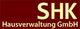 Logo von SHK Hausverwaltung GmbH auf rotem Hintergrund, gelbe Schrift.