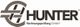 Logo von Hunter Rechnungsprüfung GmbH mit stilisiertem Emblem und Schriftzug in Braun und Schwarz.