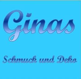 Text: "Ginas Schmuck und Deko" in blauer Schrift auf hellblauem Hintergrund.