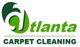 Logo for Atlanta Carpet Cleaning in green text with a green abstract design.